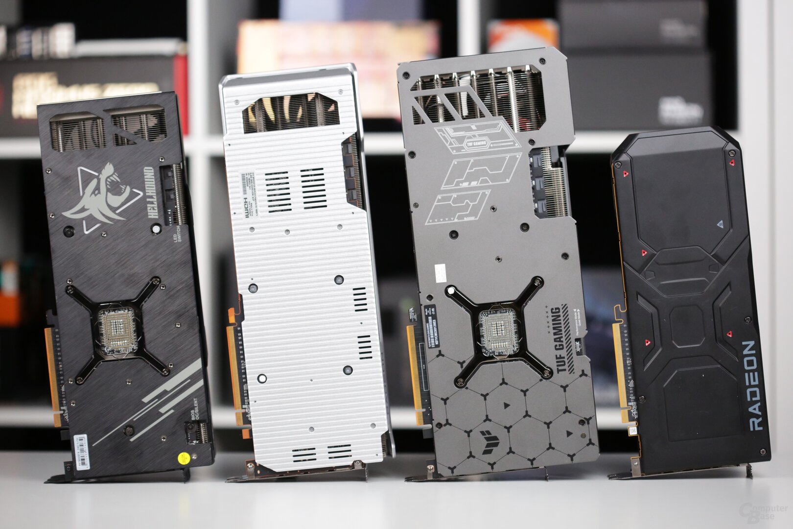 Radeon RX 7900 XTX: PowerColor Hellhound, XFX Merc 310, Asus TUF Gaming and reference design (left to right)