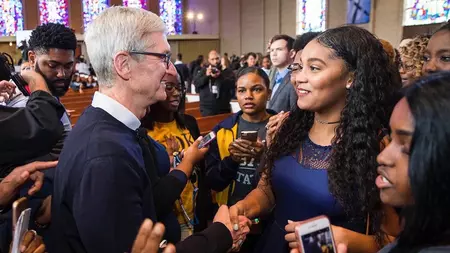 Tim Cook with a group of young people